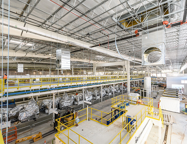 Interior view of a complex manufacturing facility.